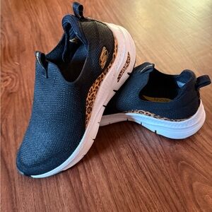 Skechers Women’s Black and Leopard Slip-On Sneakers